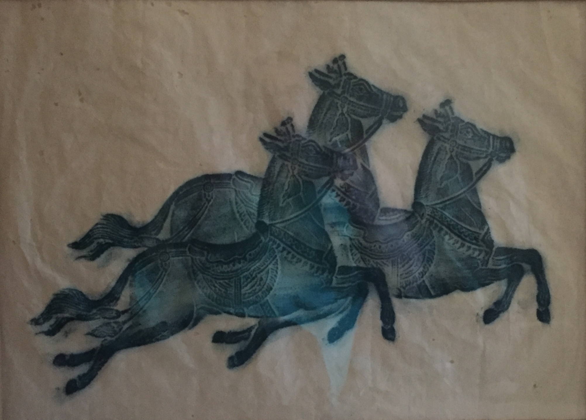 Green-blue rubbing of three Arabian horses